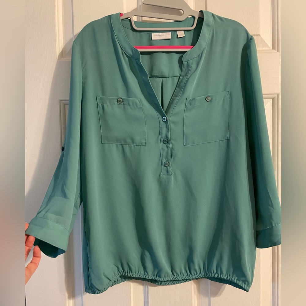 Medium weight blouse. I’m a size 6 and 5’4”.